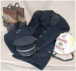 a historical Naperville Firefighter uniform, rubber boots and fireman helmet