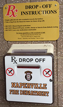 Prescription Drug Drop Box Program a wall-mounted prescription drug drop box on a Naperville fire station