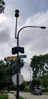 small cell equipment mounted on a street light pole