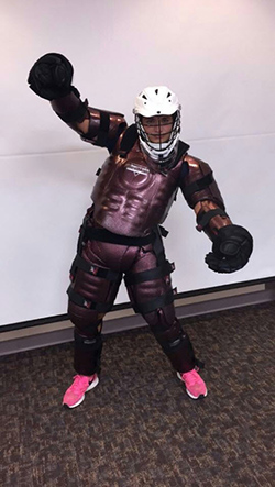 An NPD intern in protective gear